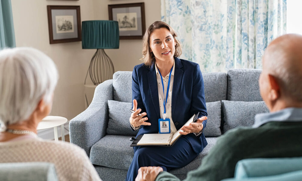 an NDIS registered social worker providing assistance to an elderly couple